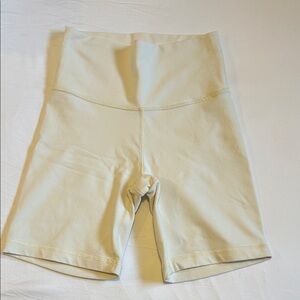 TNA Action 7” biker shorts | Butter yellow
